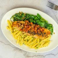 Fresh Salmon · Healthy. Salmon, served with penne pasta and sautéed spinach with tomato caper relish sauce.