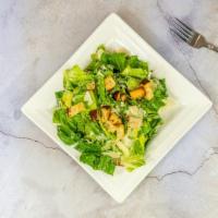 Caesar Salad · Healthy. Romaine lettuce, croutons, shaved Parmesan cheese, caesar dressing.