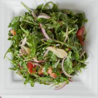 Arugula Salad · Healthy. Arugula, fresh diced tomatoes, red onions, shaved Parmesan, lemon vinaigrette.