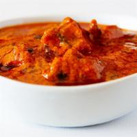 Chicken Tikka Masala · chicken breast meat boneless cooked in clay oven tandoor and  mix with tomato sauce with cre...