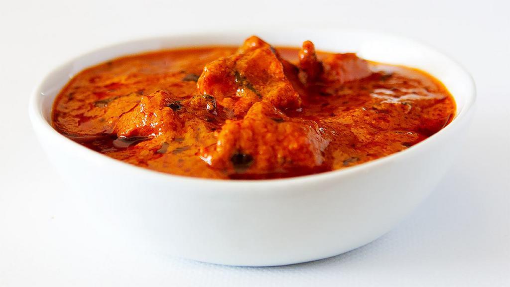 Chicken Tikka Masala · chicken breast meat boneless cooked in clay oven tandoor and  mix with tomato sauce with cream.