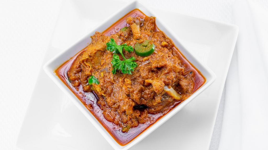 Karahi Chicken · chicken cooked in tomatoes  and onions base curry from north pakistan