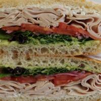 Turkey Sandwich · avocado, ricotta, tomato, onion, greens