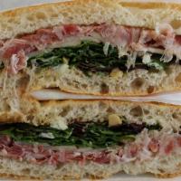 Prosciutto Sandwich · pear, blue cheese, pickled onions, walnut, balsamic, greens
