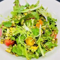 Cilantro Lime Salad · Organic baby greens, heirloom tomatoes, grilled corn, jack cheese, pumpkin seeds, cilantro-l...