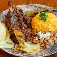 Slow-Cooked Barbacoa Costillas · Halal, spicy. Two fall-off-the-bone beef ribs slow-cooked in banana leaves with Mexican chil...