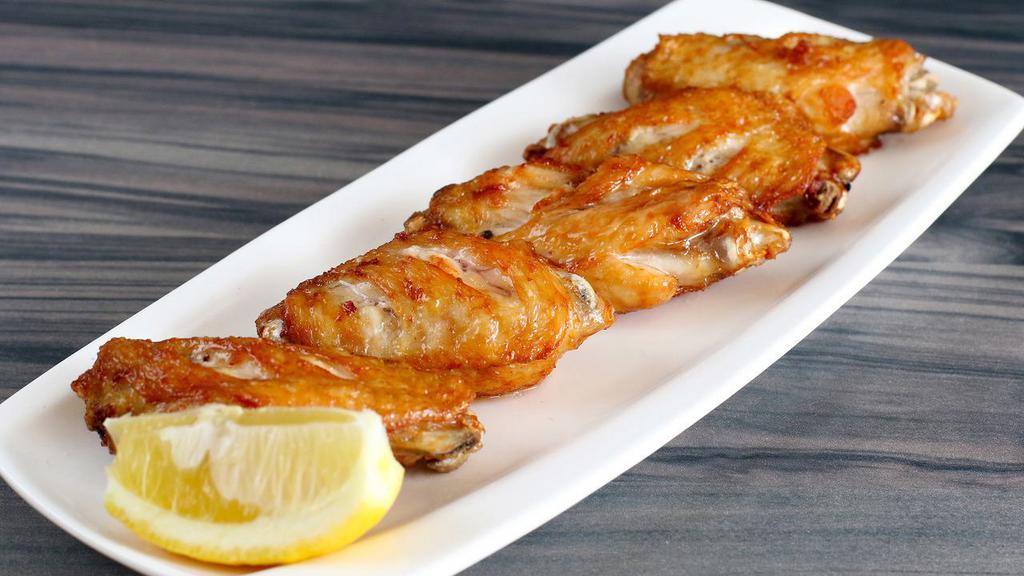 F2. Chicken Wings · Deep-fried marinated chicken (5 pieces).
