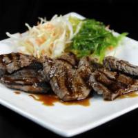 E3. Beef Teriyaki · Broiled beef with teriyaki sauce
