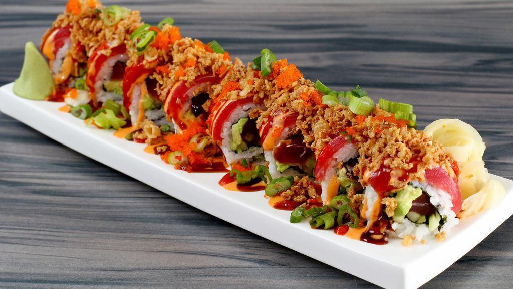 H9. Spicy Crunchy Roll (Real crab meat inside) · Real crab meat, topped with cucumber, avocado, tuna masago, fried shallots, green onion, sriracha and sweet kabayaki sauce, spicy mayo sauce.