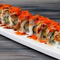 H15. Spider Roll (imitation crab meat inside) · Fried soft shell crab, cucumber, imitation crab, masago, avocado, and cucumber, topped with ...