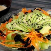 L3. Avocado Salad · Mix salad cucumber seaweed onion tomato and sesame sauce.