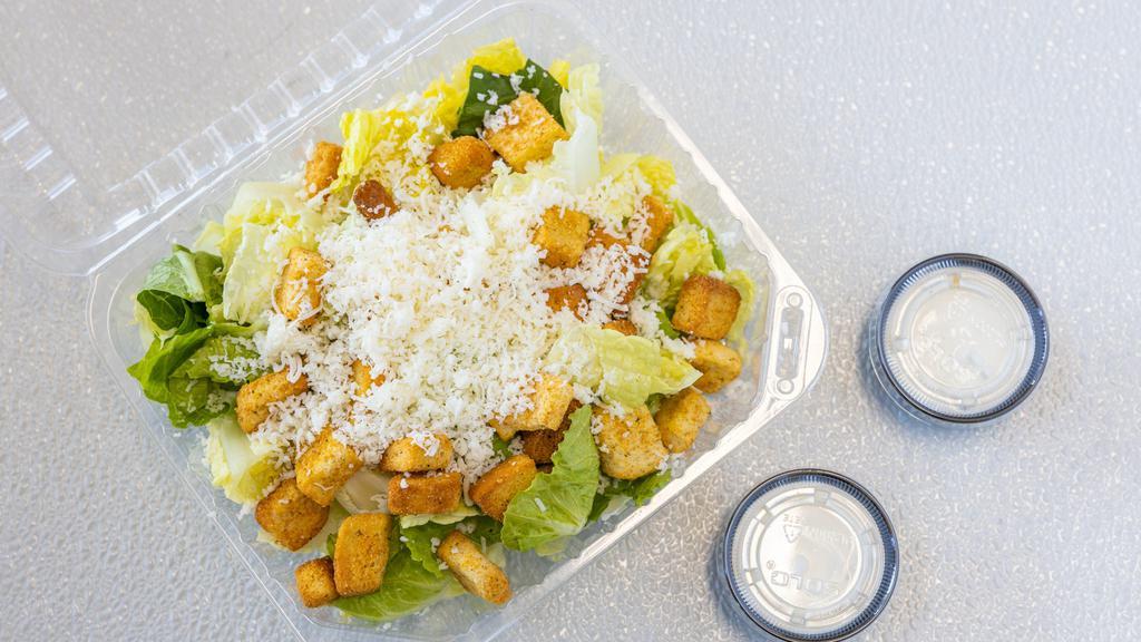Ceasar Salad · Generous portion of romaine lettuce and croutons.