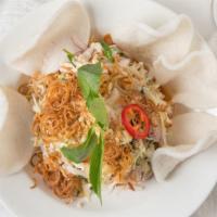 Chicken Salad · Shredded mary’s chicken, green cabbage, banana blossom, rau ram, carrots, red onion fried on...