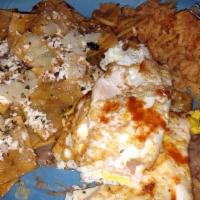 Chilaquiles · Eggs scrambled with crisp corn tortillas, red or green sauce topped with onion, oregano and ...