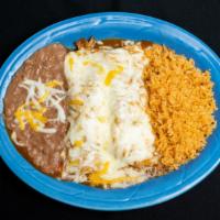 Enchiladas Rojas · Two enchiladas with choice of ground beef, chicken, pork or cheese. Topped with red sauce an...