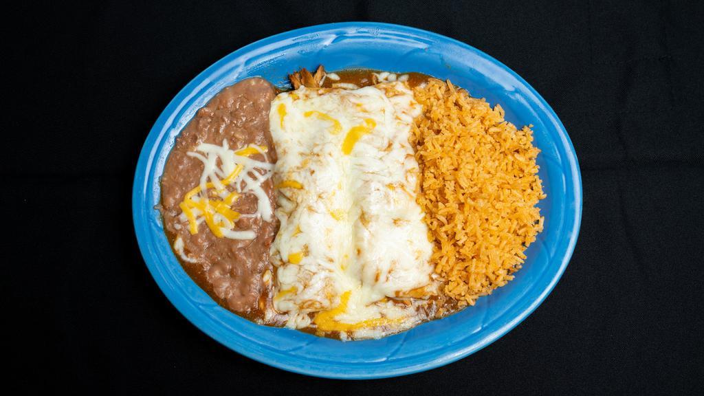 Enchiladas Rojas · Two enchiladas with choice of ground beef, chicken, pork or cheese. Topped with red sauce and cheese. Served with refried beans and rice.