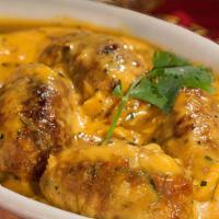 Malai Kofta (3 pcs) · Vegetables and cheese dumplings cooked in mildly spiced sauce.