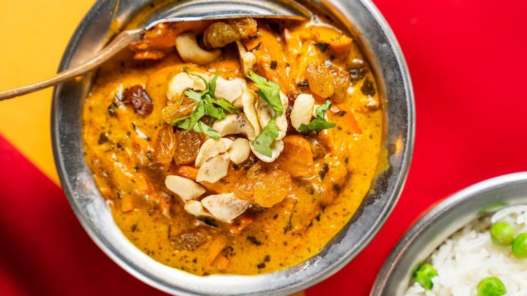 Butter Chicken · Gluten-free. Boneless tandoori chicken cooked with cream, nuts, onions, tomatoes and spices in a rich thick butter sauce. Served mild, medium or hot with a side of basmati rice, brown rice or naan.