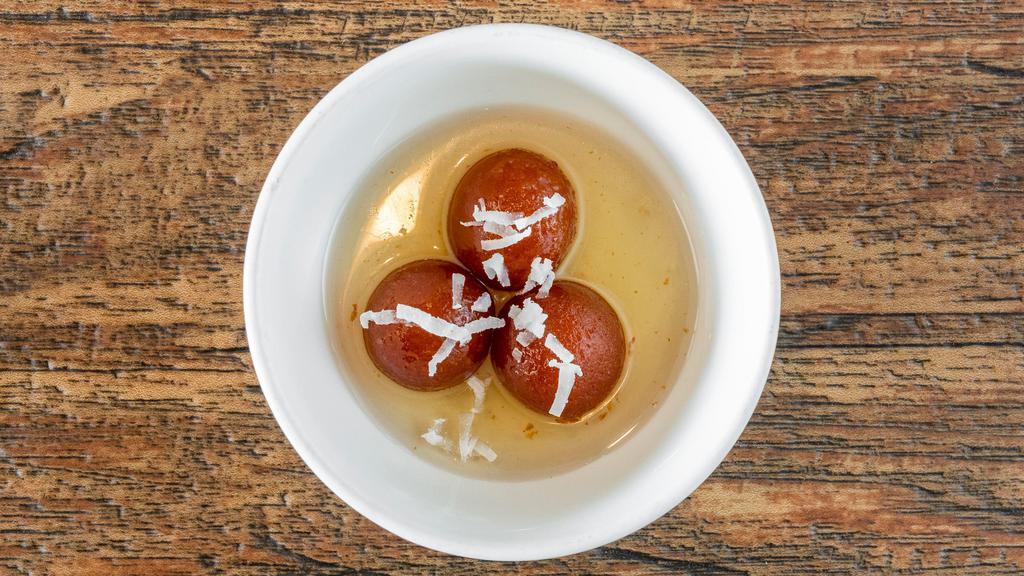 Gulab Jamun · Soft delicious berry sized balls made of milk solids, flour & a leavening agent – soaked in rose flavored sugar syrup.
