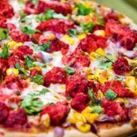 Dhoom (Tandoori Pizza) · Tandoori sauce, red onions, bell peppers, sweet corn, chicken and mozzarella cheese, topped ...