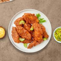 Insane Flamin' Hot Wings · (Eight pieces) Fresh chicken wings breaded, fried until golden brown, and tossed in flamin' ...