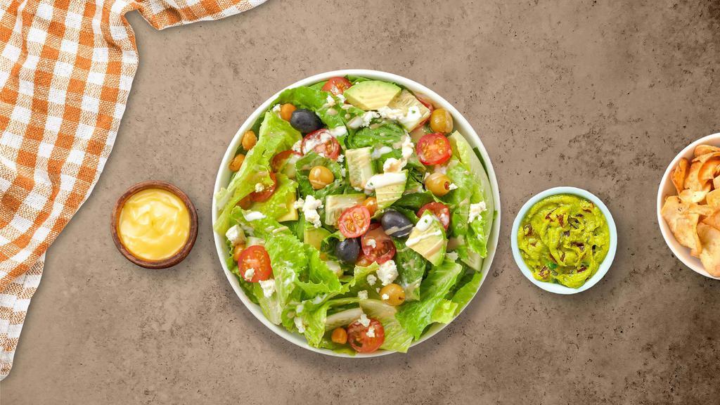 Make It Mediterranean Salad · Iceberg lettuce, bell peppers, red onions, fresh Roma tomatoes, green olives, green onions, feta cheese, basil, and oregano tossed olive oil vinaigrette or your choice of dressing.