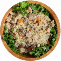 Pork Fried Rice · Pan-fried rice with pork, celery, carrots, mushrooms, yellow onions and green onions.
*We pr...
