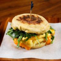 Breakfast Sandwich – Egg and Cheese Only · soft scrambled eggs, aged sharp cheddar, wild arugula, our green herb sauce, Wolferman’s eng...
