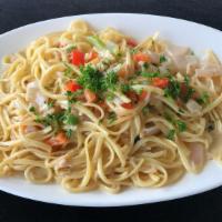Crab Linguine (White Sauce) · Crab meat, linguine, basil, red pepper, green pepper, onion, wine, heavy cream topped with p...