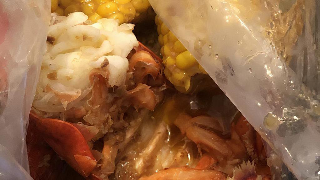 Lobster Tail (1Lb) · Each lb comes with corn & potato.