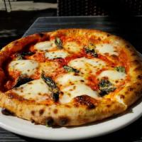 Margherita Pizza · fresh mozzarella, San Marzano tomato sauce, sweet basil, EVOO