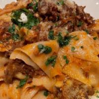 Braised Short Ribs Pappardelle · spicy tomato sauce, parmigiano, EVOO