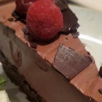 Chocolate Mousse Cake · smooth chocolate mousse on a dark chocolate crust, whipped cream