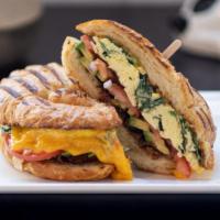Breakfast Sandwich · Two scrambled eggs and cheese on your choice of toast, bagel, or croissant. Add bacon, ham, ...