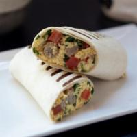 Breakfast Burrito · Two eggs, cheese, tomatoes, spinach and sausage in a wrap with a side of our homemade chipot...
