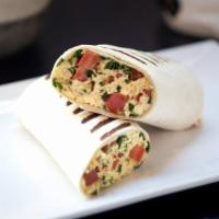 Veggie Breakfast Burrito · Two eggs, cheese, tomatoes, spinach and avocado in a wrap with a side of our homemade chipot...