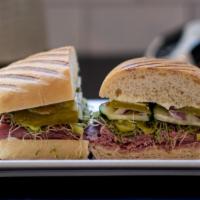 Corned Beef · Corned beef with sprouts, cucumbers, pepperoncini, pickles and onions with mayo and honey di...