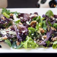 Garden Salad · Spring mix, feta cheese, toasted walnuts, dried cranberries tossed with homemade balsamic vi...