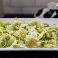 Cesar Salad · Romaine lettuce, croutons, parmesan cheese, and Caesar dressing.