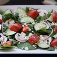 Spinach Salad · Spinach, red onion, mushrooms, cucumbers, tomatoes, feta cheese, and balsamic vinaigrette.