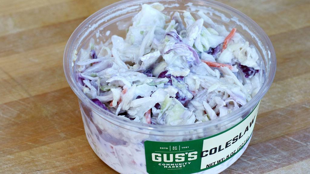 Coleslaw · Eight ounces side. Shredded cabbage, carrots, mayonnaise, apple cider vinegar, stoneground mustard, parsley, salt, and pepper.