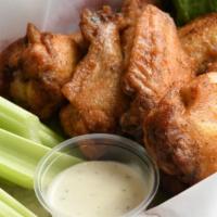 Ernestine's Wings · Baked chicken drummettes (8) with our homestyle buffalo, bbq or garlic sauce.