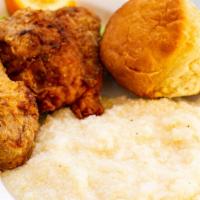 Brother Darroll · 2 pcs of chicken prepared Southern style or smothered in gravy & onions, grits & a hot fluff...