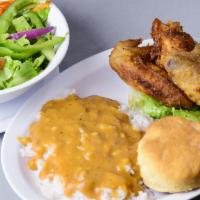 Taste of Toussaint (2 Wings) · Rice & gravy, green salad & a hot fluffy biscuit
