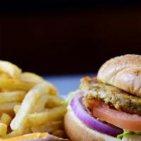 Naima's Veggie Burger · Grilled veggie patty w/ lettuce, tomatoes & red onions on wheat bread.