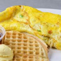 Justin's Omelet · A combination of cheese, chicken, & onions in a delicious omelet served with french fries or...