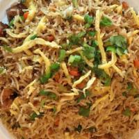 3. Chicken Fried Rice · Rice cooked with marinated chicken and fresh vegetables seasoned with spices.
Spice Level: L...