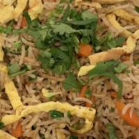 13. Egg Fried Rice · Rice cooked with fresh vegetables and eggs seasoned with spices.
Spice Level: Less/Medium/Mo...