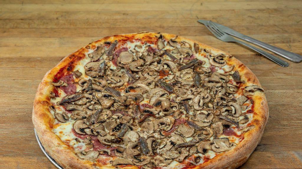 Pizza a la Toto's No. 1 Small/Medium · Salami, mushrooms, and anchovies.