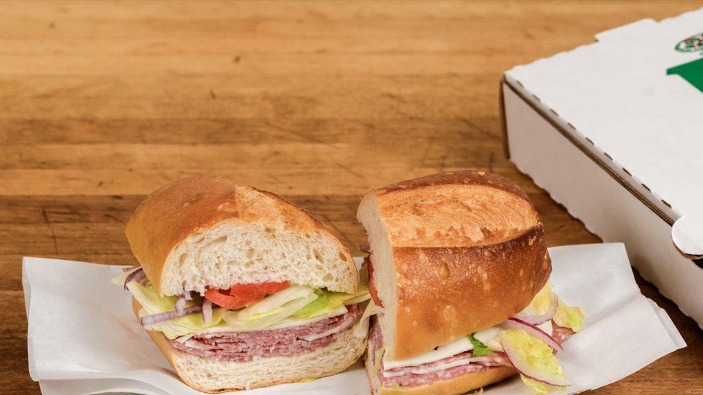 Salami & Cheese Sandwich Cold · Sour Dough Roll ,Lettuce, tomato, onion, and side of pepperoncinis.